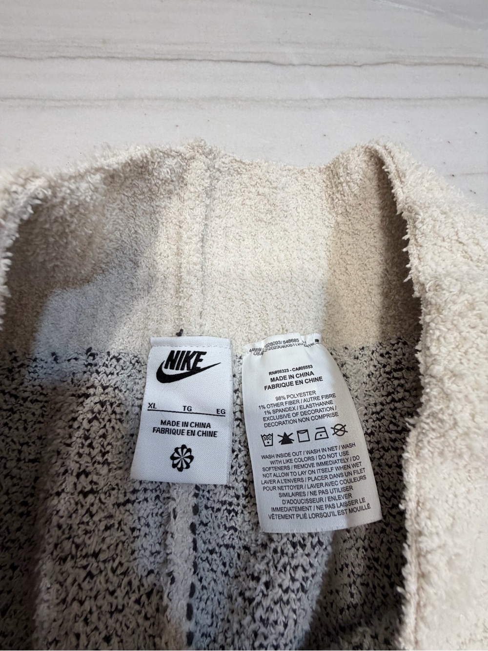 Nike White Track Pants with Black Swoosh Print - Picture 2 of 2